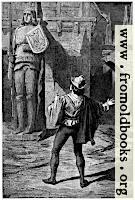 A giant wooden statue of a warrior with shield and sword